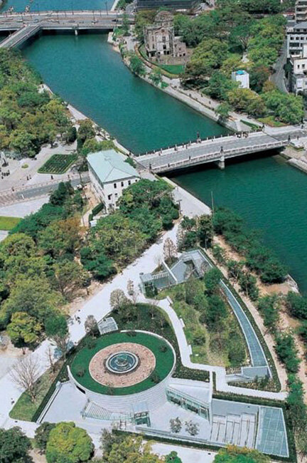 The Memorial Hall is located in Peace Memorial Park, south of the Atomic Bomb Dome and near the west end of the Motoyasu-bashi Bridge